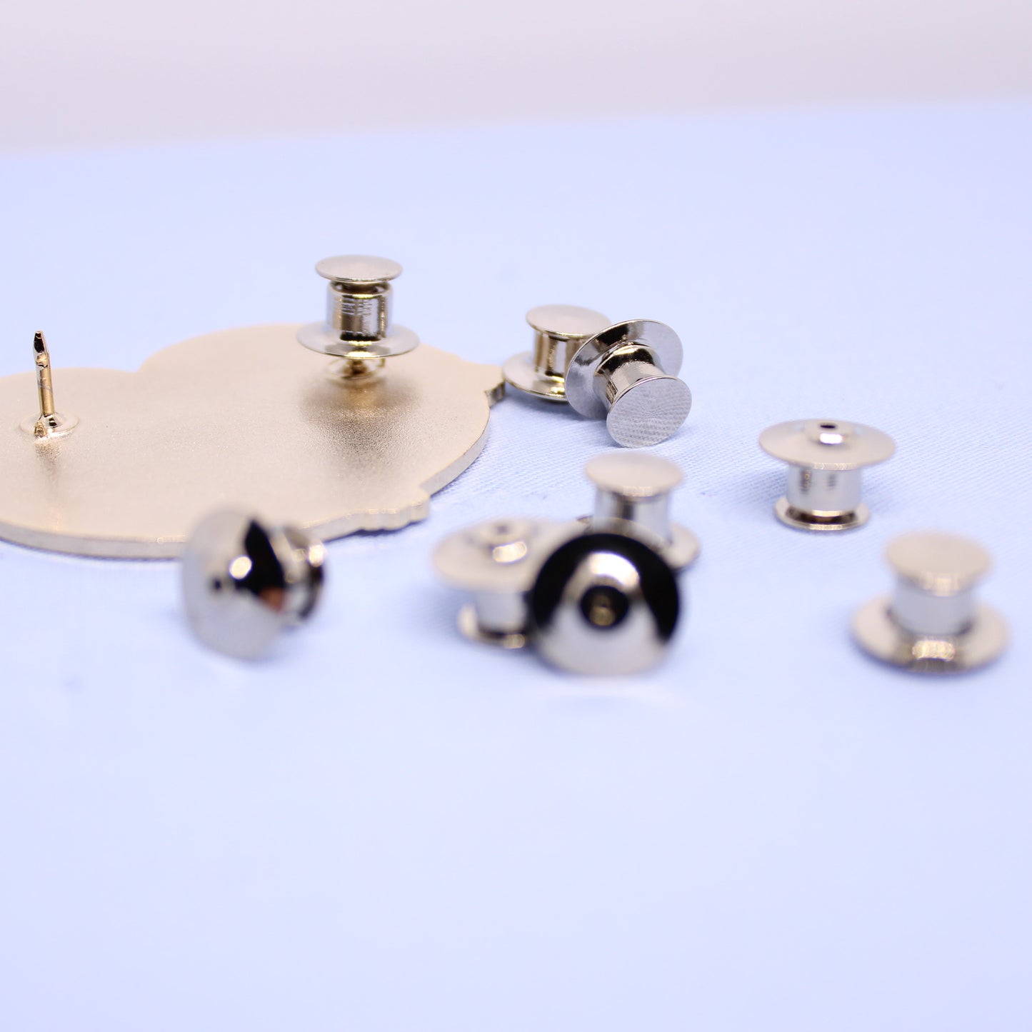 locking pin-back add-on