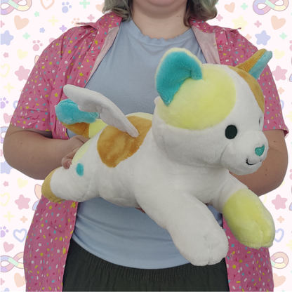 sandy the OCD kitty laying cuddle plush